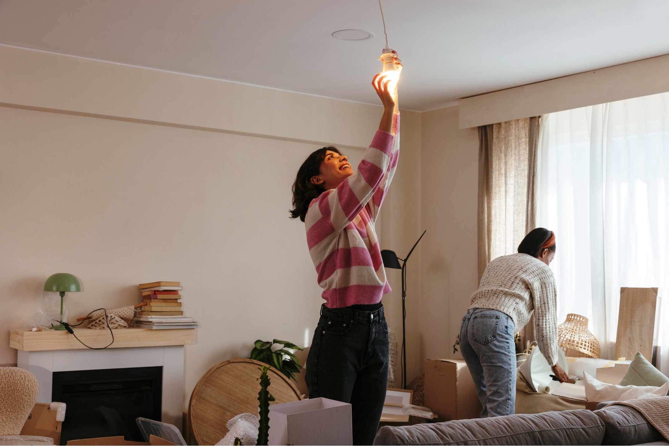 Person washing hands in a sink
